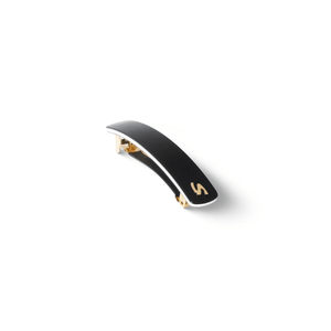 Sacrae Barrette Classique medium black and cream — worn in a low bun, side profile