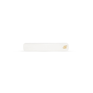 Sacrae Barrette Classique medium in cream and black — polished acetate on a clean surface