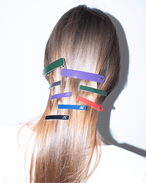 Barrette M Purple Karma — overhead flatlay on editorial surface