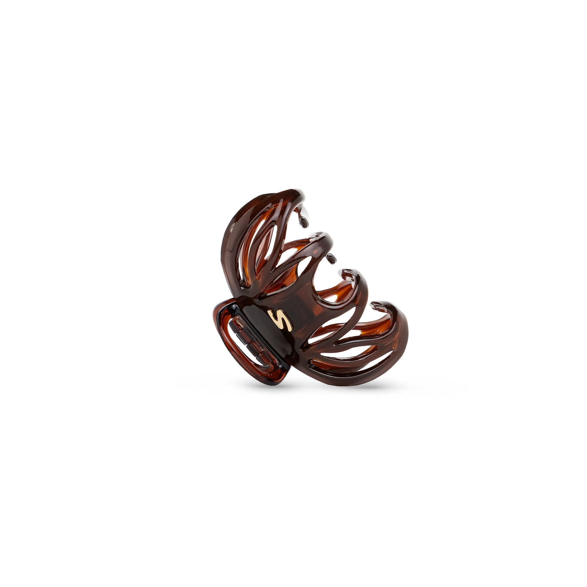 Lena Small Claw Clip tortoise — detail of the inner grip teeth and S mark