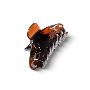 Sacrae Melissa claw clip tortoise — worn in a full updo, side profile