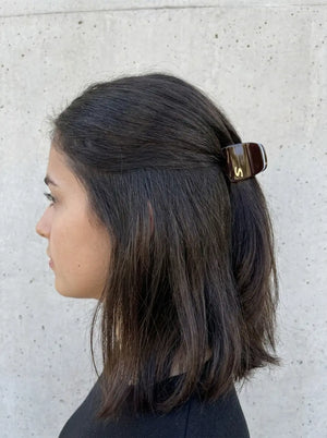 Model wearing Sacrae Pince XS Twilight Mirage Capsule Edition, half-up hairstyle, street, side view