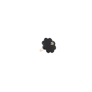 Sacrae Petite Fleur glossy black — worn at the side part, light styling