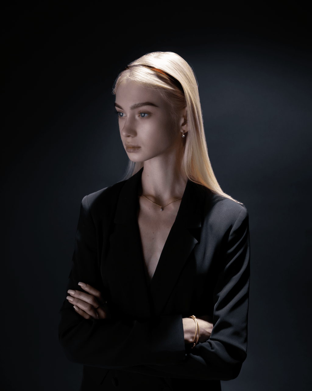 Signature Headband glossy black — editorial flatlay, overhead angle