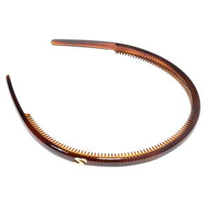 Sacrae Signature Headband tortoise — worn pushed back, face-framing