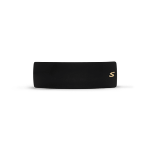 Sacrae Barrette Classique large in black and cream — polished acetate on a clean surface