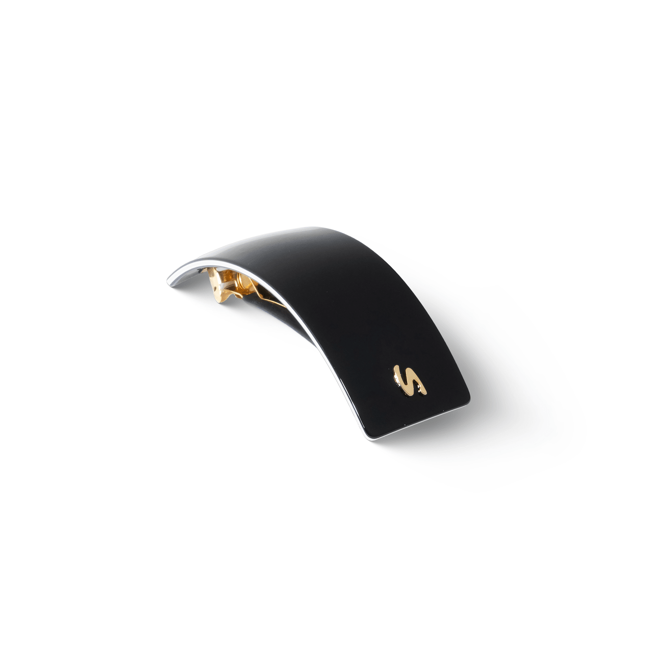 Barrette Classique large black and cream — overhead flatlay on marble