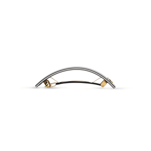 Sacrae Barrette Classique large black and cream — worn in a low bun, side profile