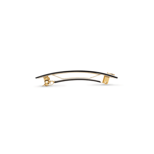 Sacrae Barrette Classique medium cream and black — worn in a low bun, side profile