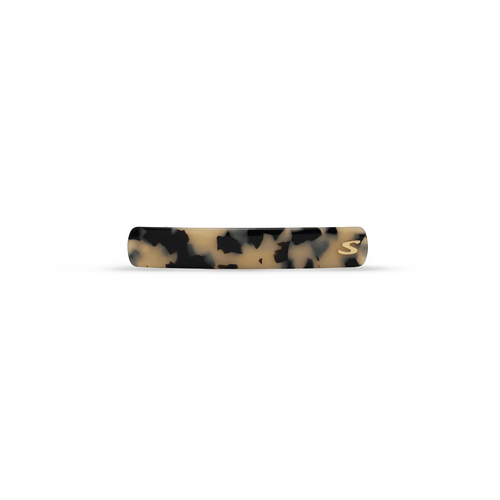 Sacrae Barrette Classique medium in white tokyo — polished acetate on a clean surface
