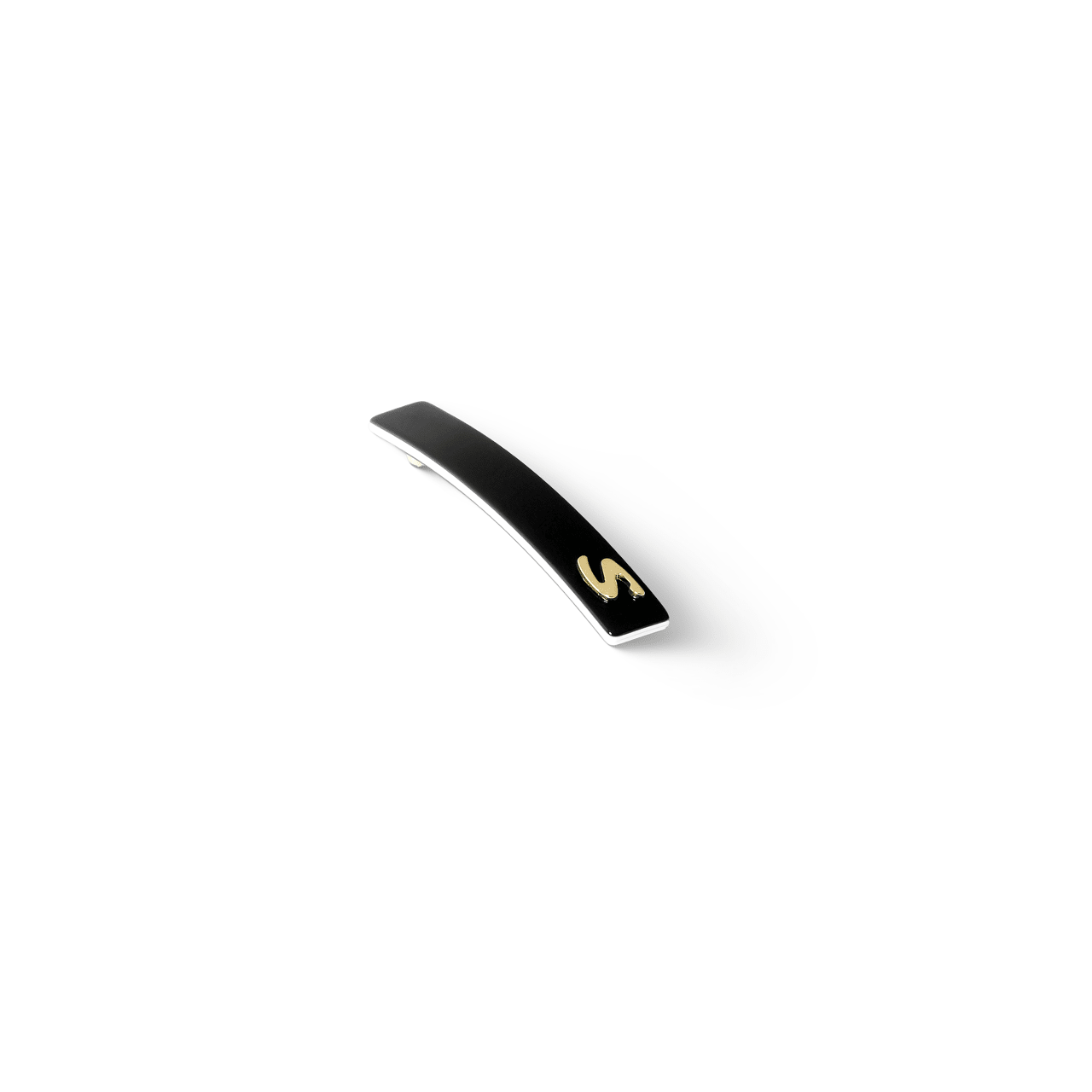 Barrette Classique small black and cream — close view of the spring mechanism and engraved S detail