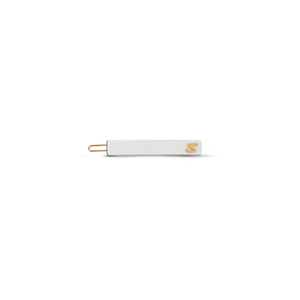 Sacrae Barrette Classique small in cream and black — polished acetate on a clean surface