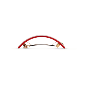 Sacrae Barrette L midnight rouge — worn pinned at the nape, evening styling