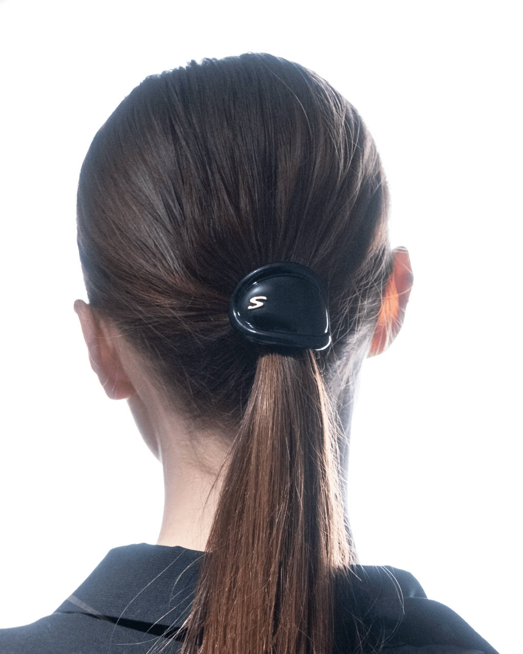 Sacrae Charmé de Cheveux glossy black — full piece showing attachment mechanism