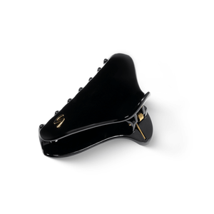 Sacrae French Yoga clip glossy black — editorial arrangement, multiple pieces