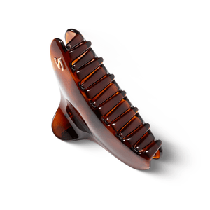 Sacrae French Yoga clip tortoise — worn holding thick hair in a high clip