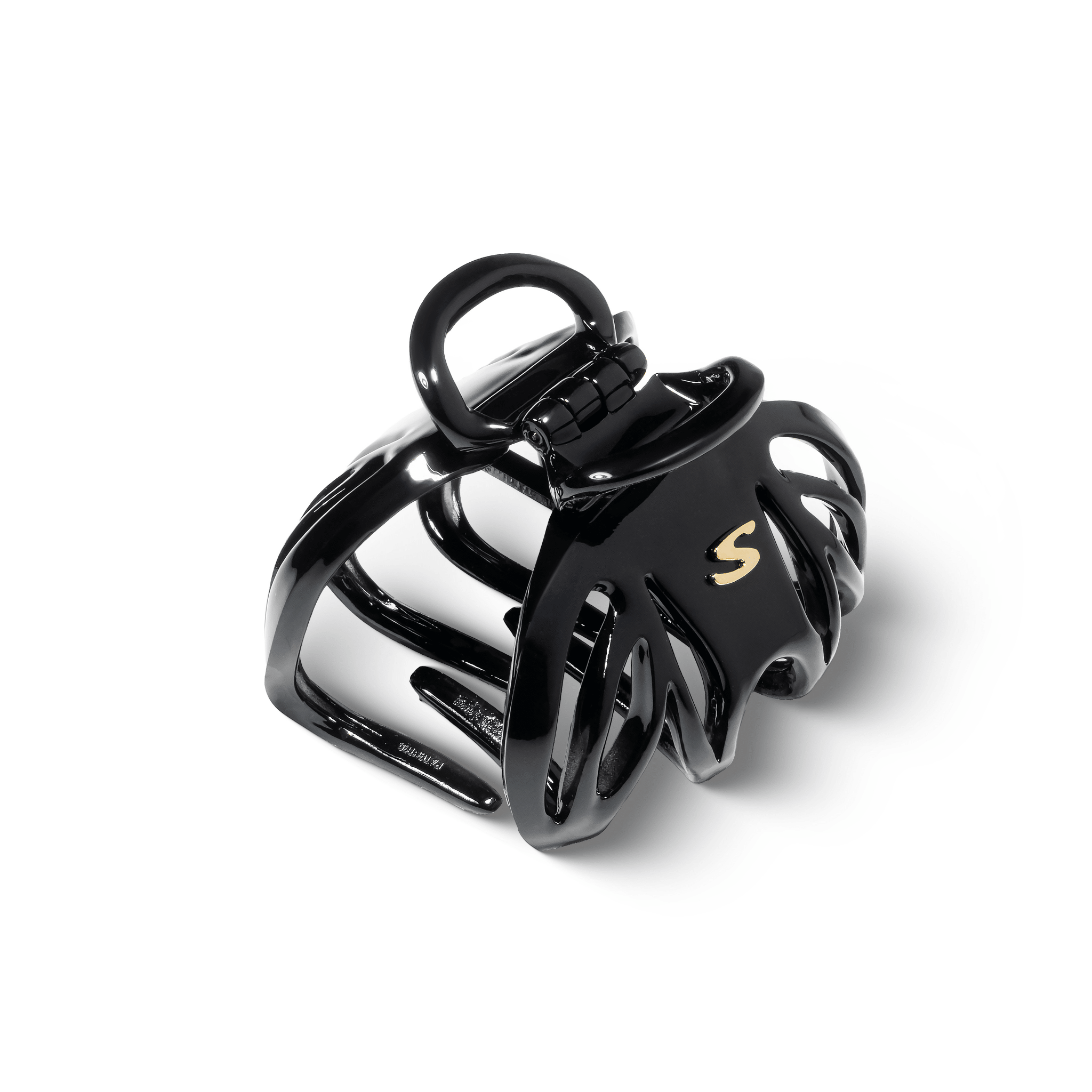 Sacrae Lena claw clip glossy black — profile shot showing curve and finish