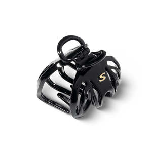 Sacrae Lena claw clip glossy black — profile shot showing curve and finish