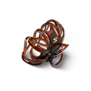 Lena Small Claw Clip tortoise — two clips arranged on marble surface