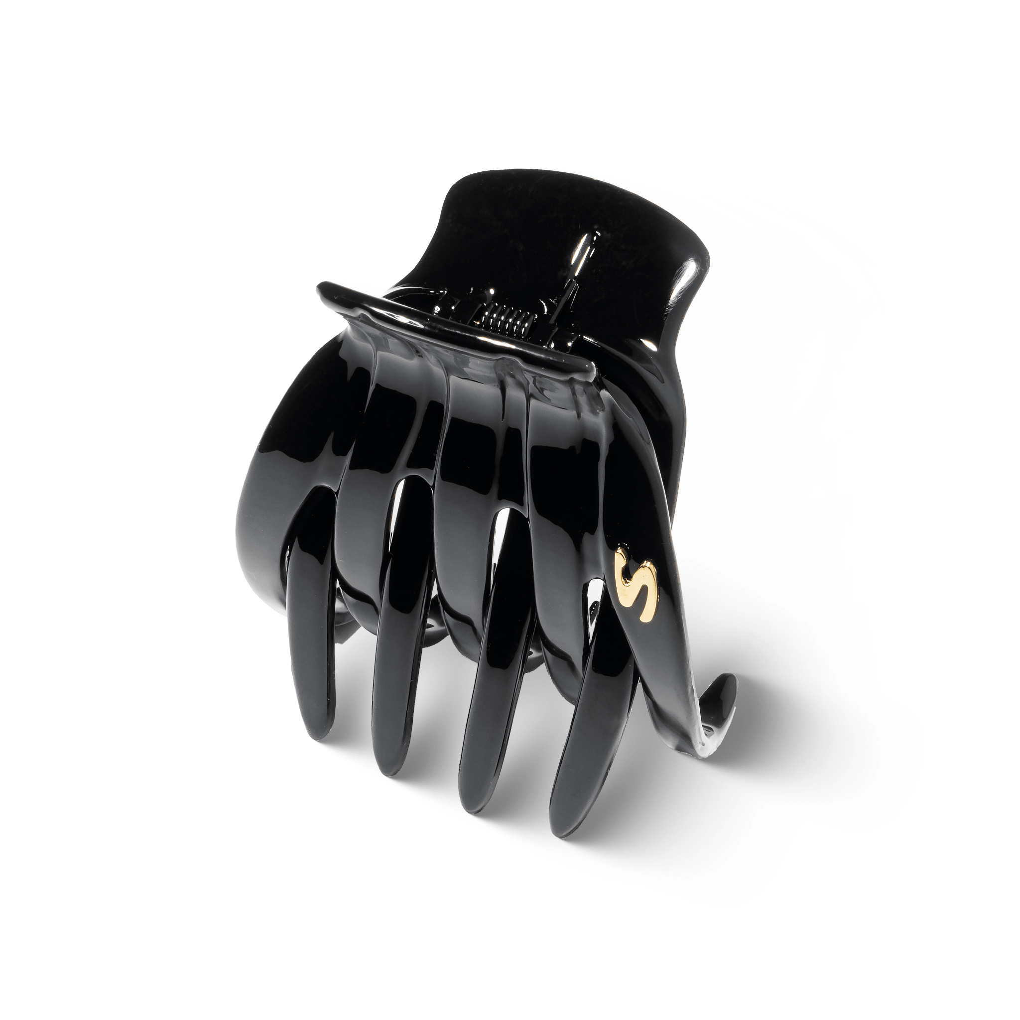 Sacrae Marina claw clip glossy black — worn in a half-up style