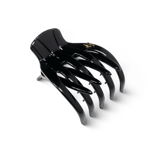 Marina Medium Claw Clip glossy black — grip detail and S embossing close-up