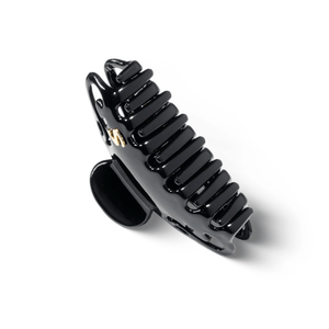Sacrae Melissa claw clip glossy black — close-up of S logo and clip body