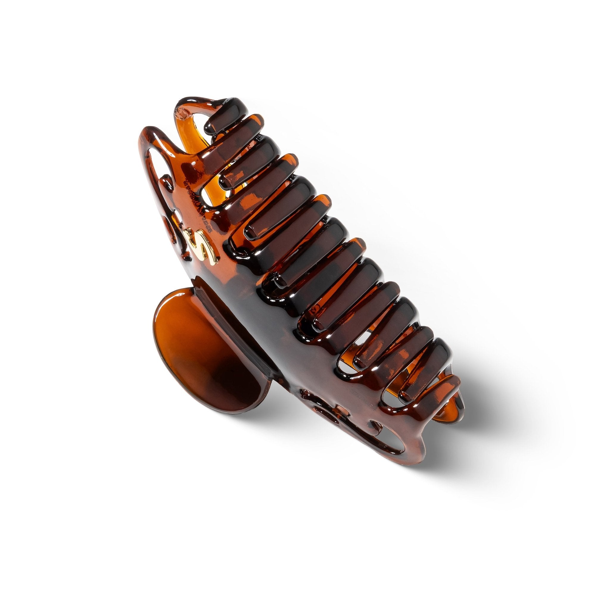 Sacrae Melissa claw clip tortoise — close-up of S logo and clip body