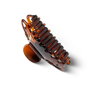 Sacrae Melissa claw clip tortoise — close-up of S logo and clip body