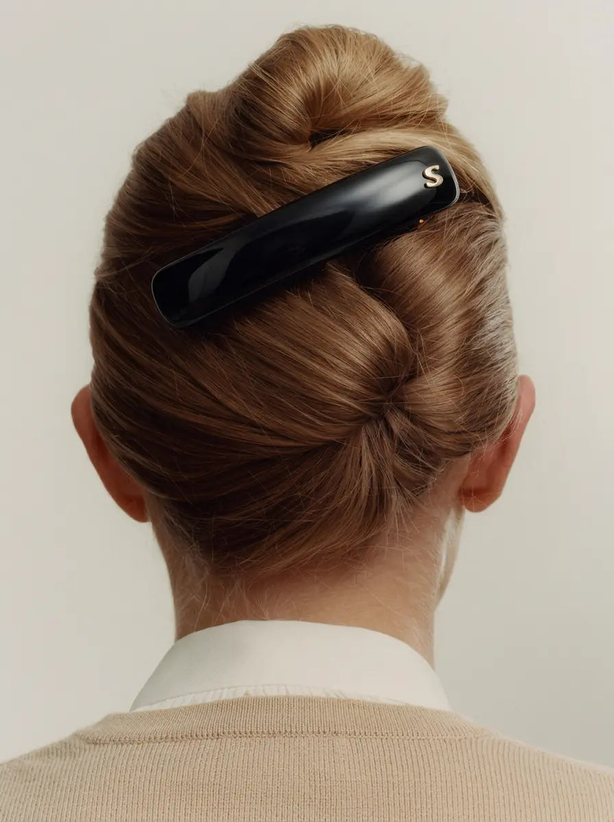 Sacrae Jonc Majesté Barrette in Tortoise on a French twist, back view