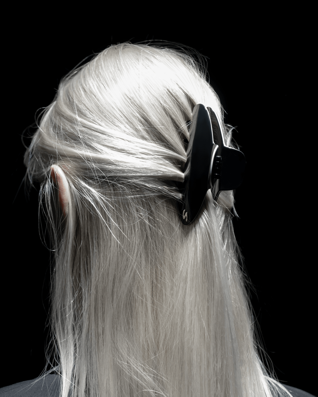 Pince Iconique large black and cream — top view showing Grip Link System™ teeth detail