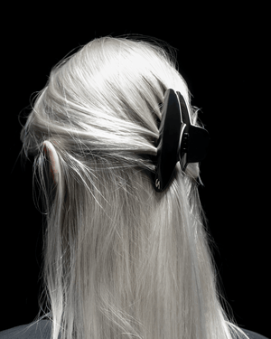 Pince Iconique large black and cream — top view showing Grip Link System™ teeth detail