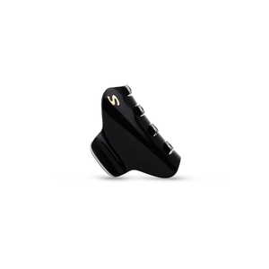 Pince Iconique medium black and cream — top view showing Grip Link System™ teeth detail