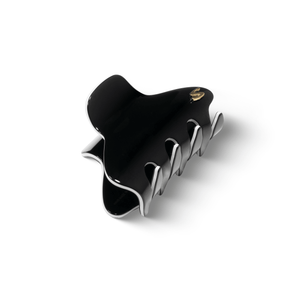 Sacrae Pince Iconique medium black and cream — worn in a half-up style, natural light