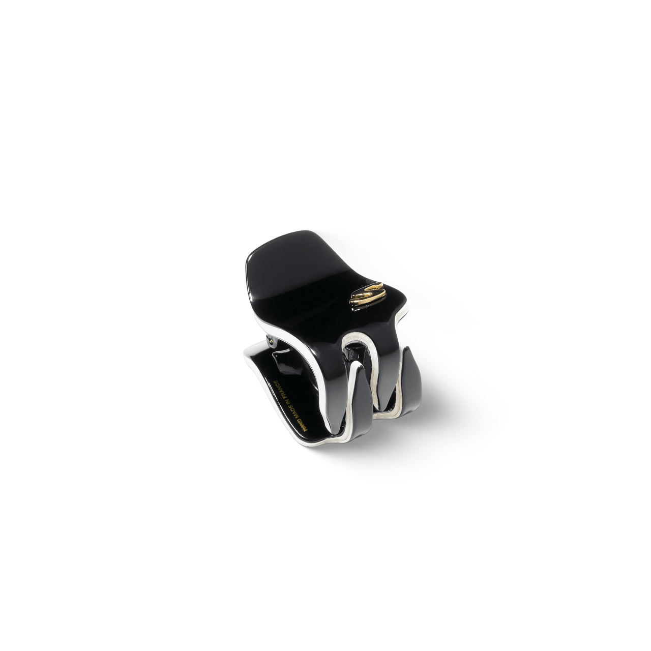 Sacrae Pince Iconique small black and cream — worn in a half-up style, natural light