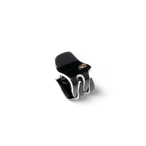 Sacrae Pince Iconique small black and cream — worn in a half-up style, natural light