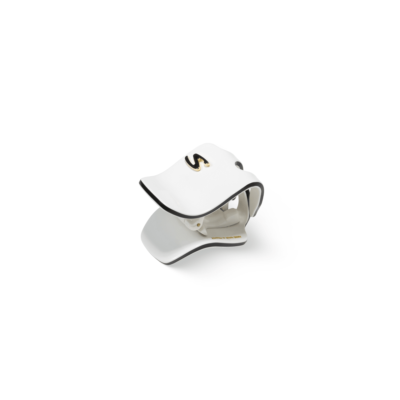 Sacrae Pince Iconique small cream and black — worn in a half-up style, natural light