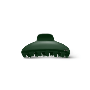 Sacrae Pince Iconique L Éclat Vert — acetate claw clip on editorial surface