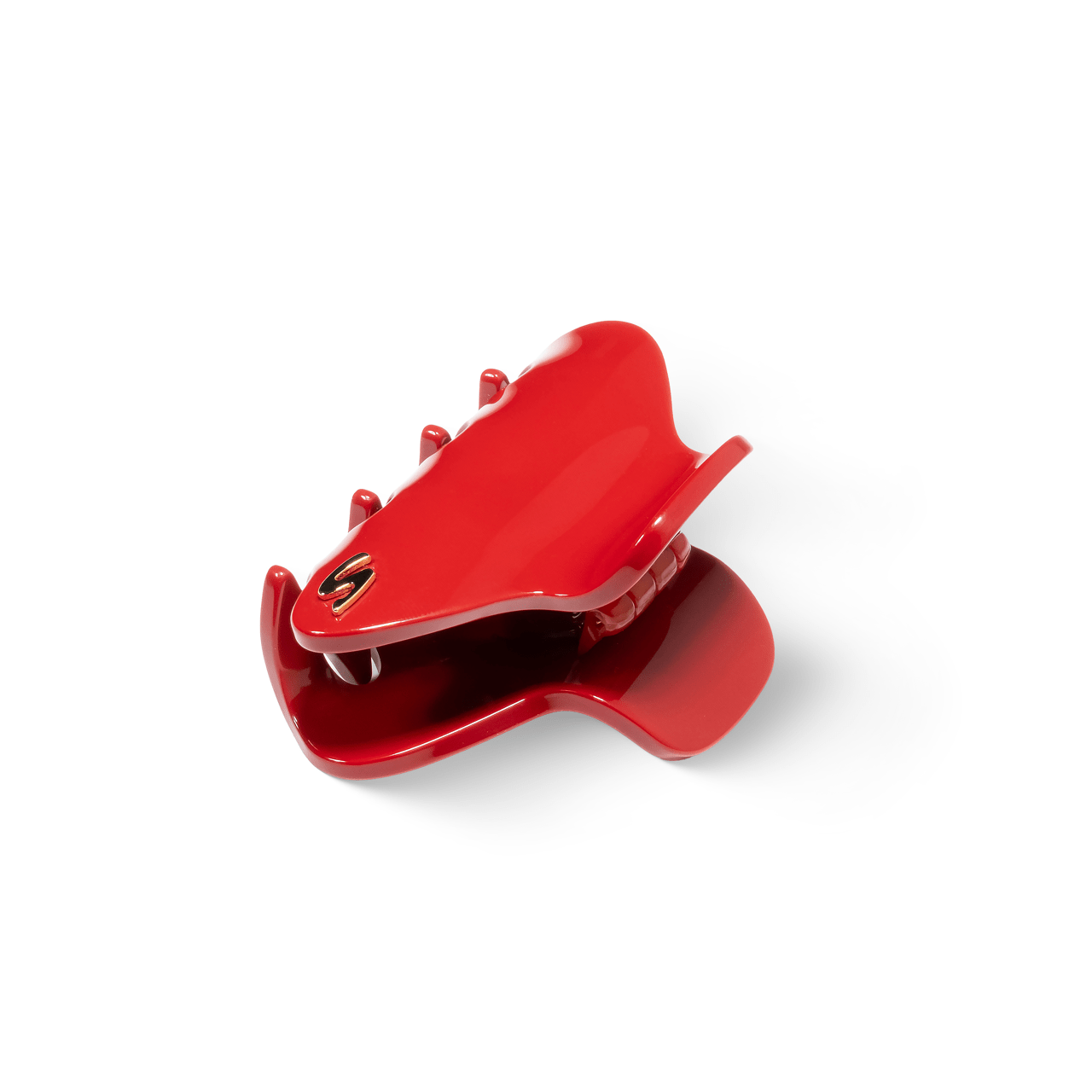 Sacrae Pince M midnight rouge — half-up style, soft lighting