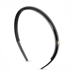 Sacrae Signature Headband in glossy black — wide acetate headband on neutral background