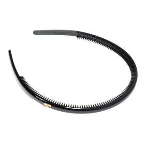Sacrae Signature Headband glossy black — worn pushed back, face-framing